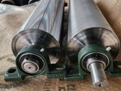 Customized rollers for conveyor systems, including driven and driven rollers, rubber-coated rollers, carbon steel rollers, and stainless steel rollers.